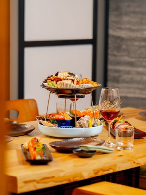 in a Japanese restaurant a traditional Japanese room for lunch a table set with fish dishes