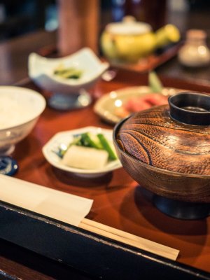 A tray with a variety of bowls of food